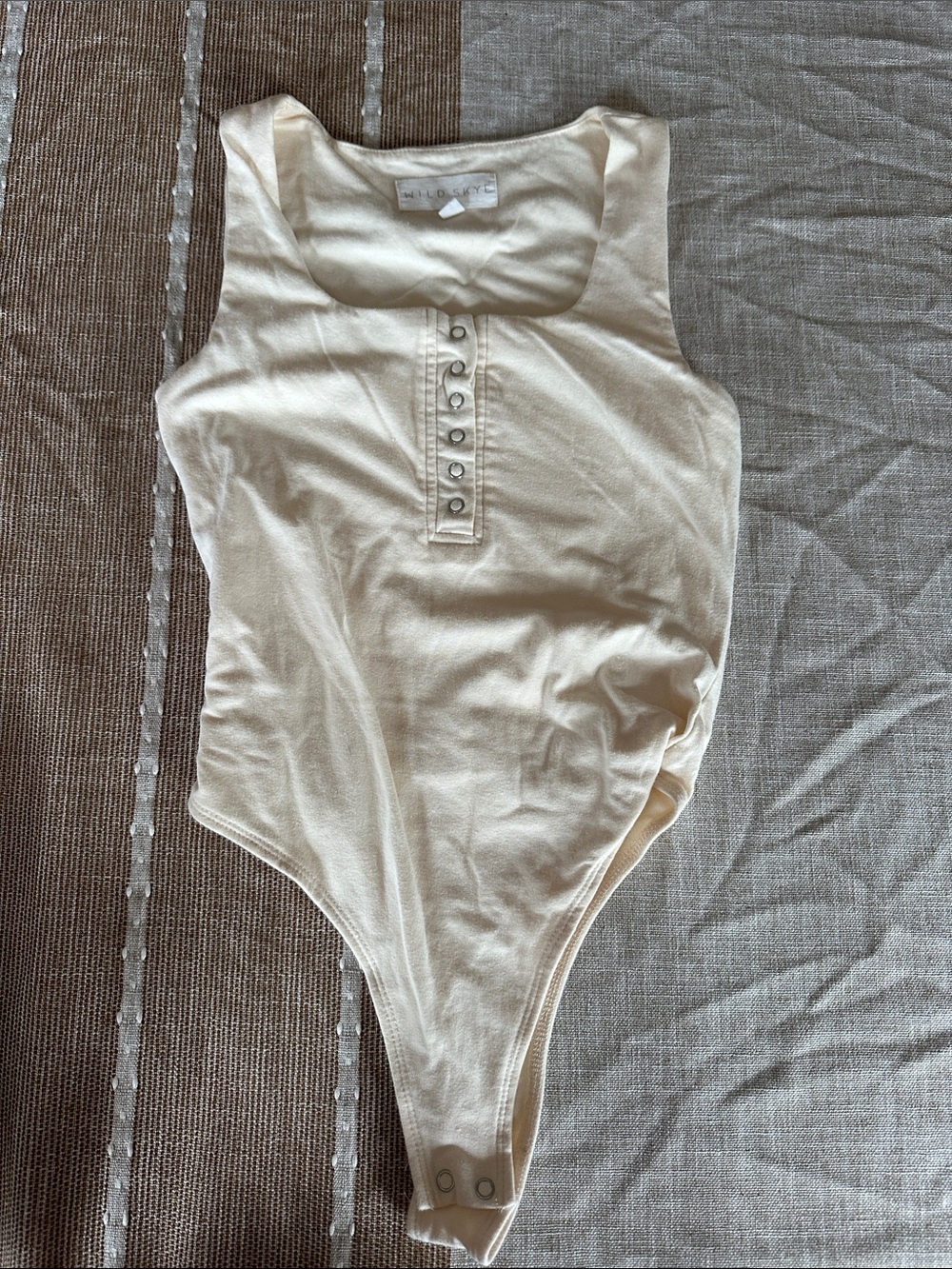 Cream Ribbed Snap-Front Bodysuit